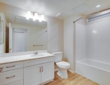 Studio apartment interior at C+C Flats in Chula Vista, CA — open living area with modern finishes