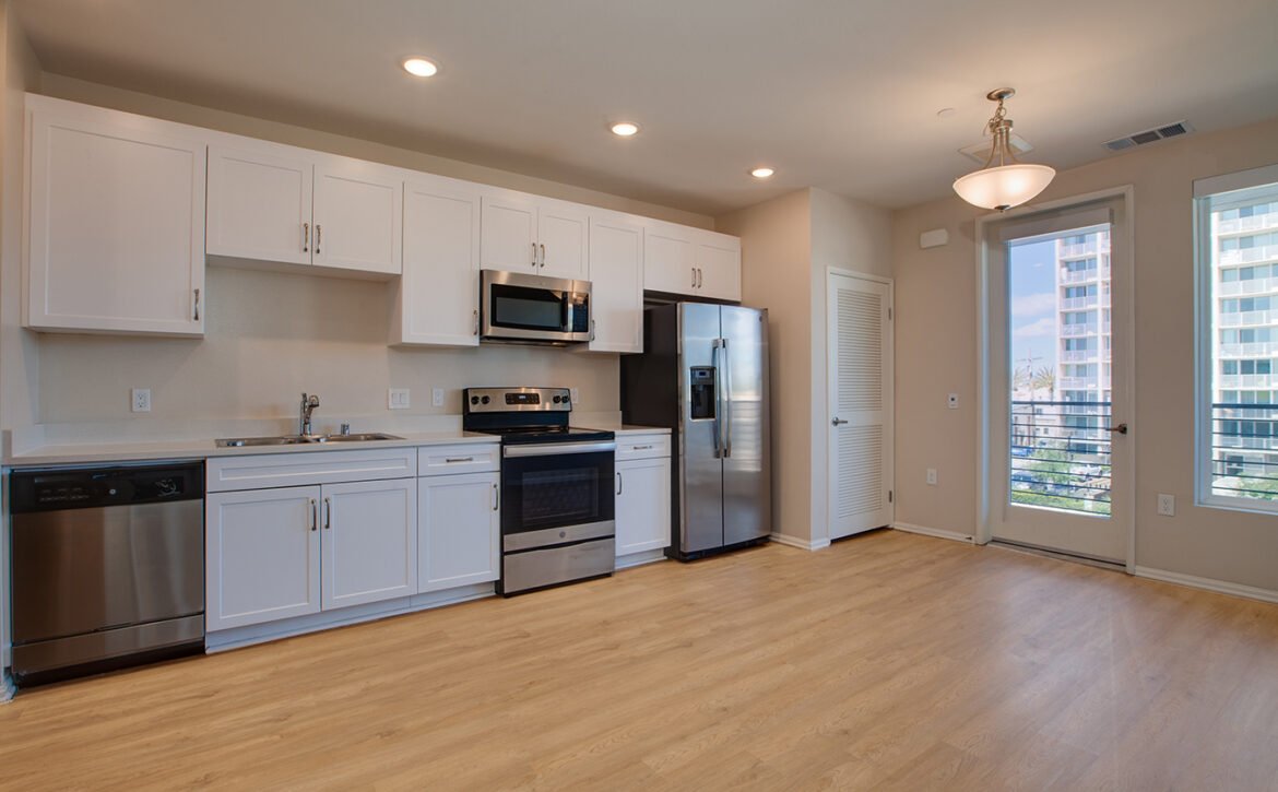 Studio apartment interior at C+C Flats in Chula Vista, CA — open living area with modern finishes