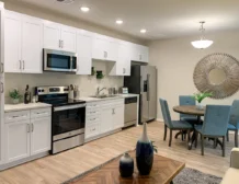 1 bedroom apartment interior at C+C Flats in Chula Vista, CA — spacious living area with modern finishes