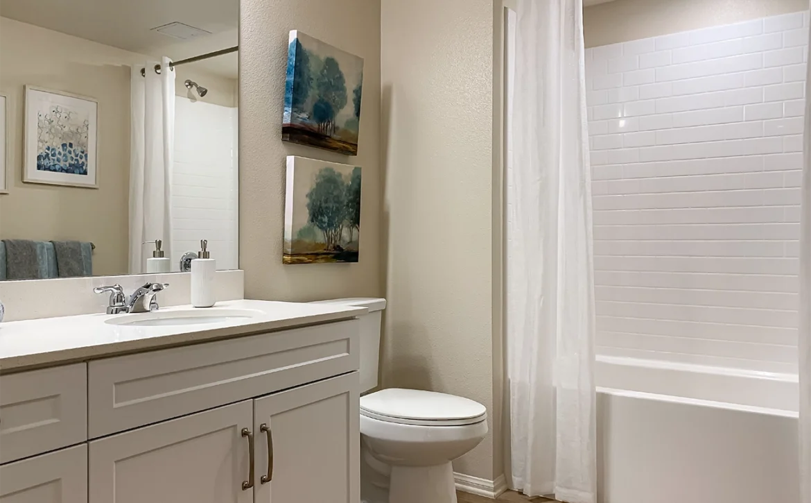 2 bedroom apartment interior at C+C Flats in Chula Vista, CA — spacious open-concept living and dining area with modern finishes