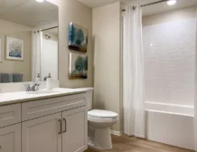 2 bedroom apartment interior at C+C Flats in Chula Vista, CA — spacious open-concept living and dining area with modern finishes