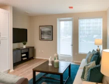 2 bedroom apartment interior at C+C Flats in Chula Vista, CA — spacious open-concept living and dining area with modern finishes