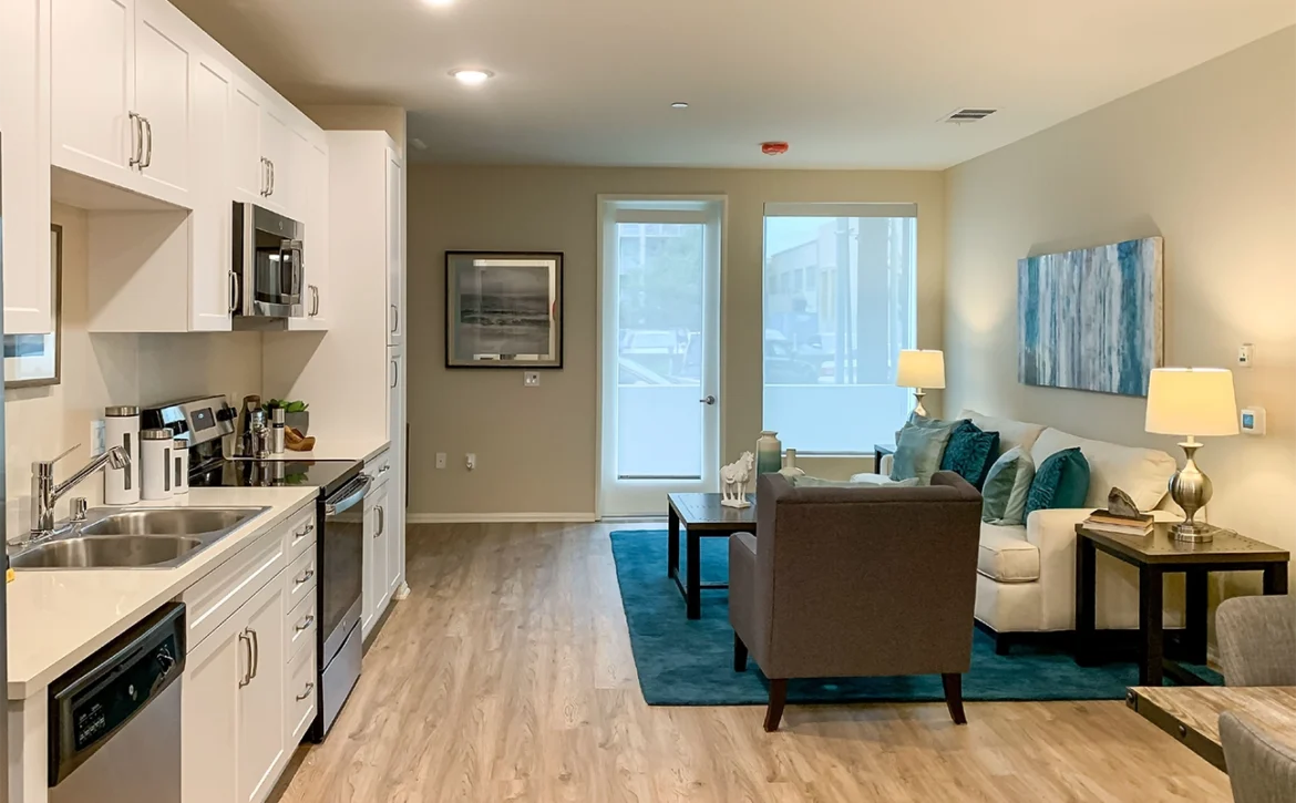 2 bedroom apartment interior at C+C Flats in Chula Vista, CA — spacious open-concept living and dining area with modern finishes