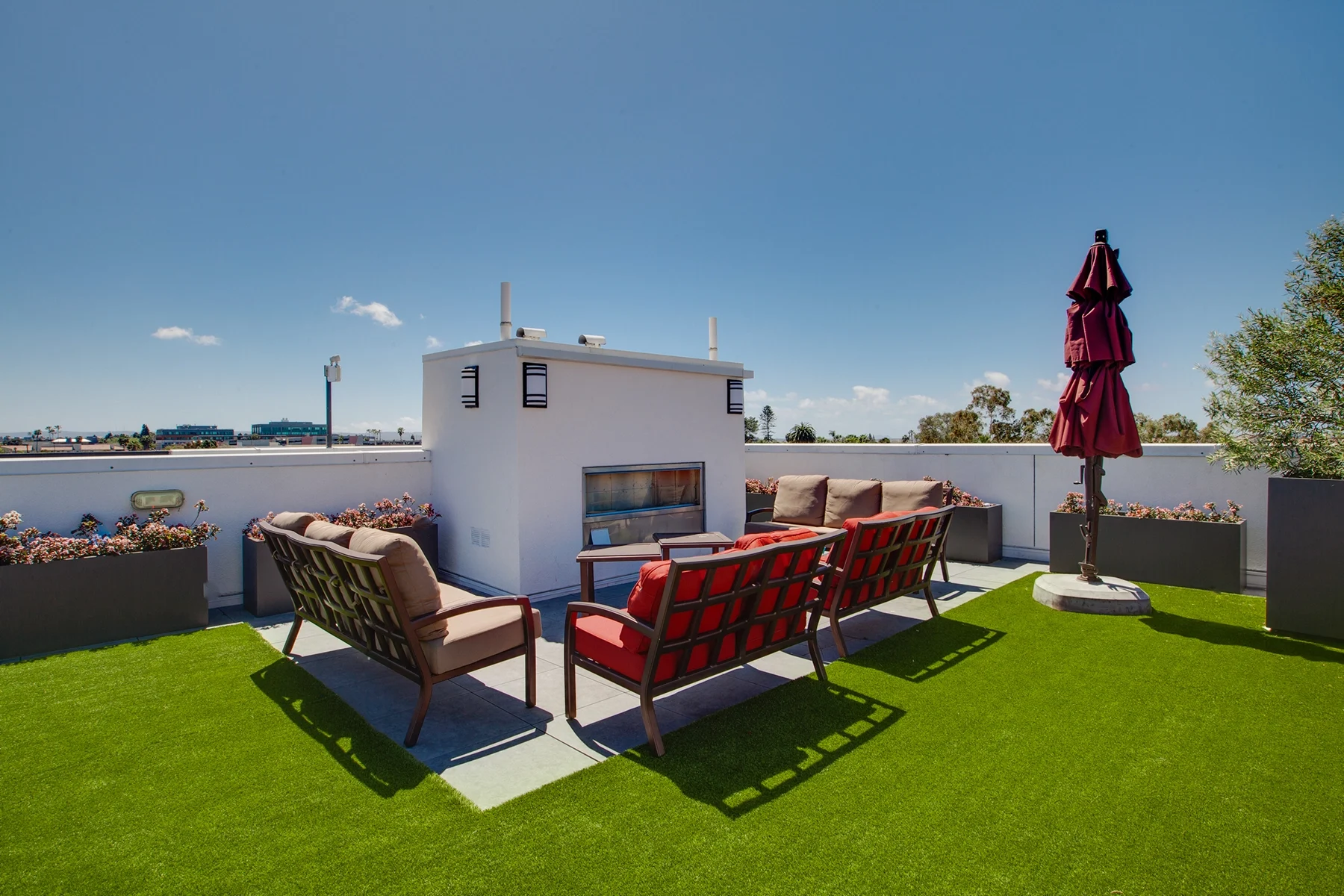 Rooftop deck overlooking Chula Vista skyline at C+C Flats luxury apartment community